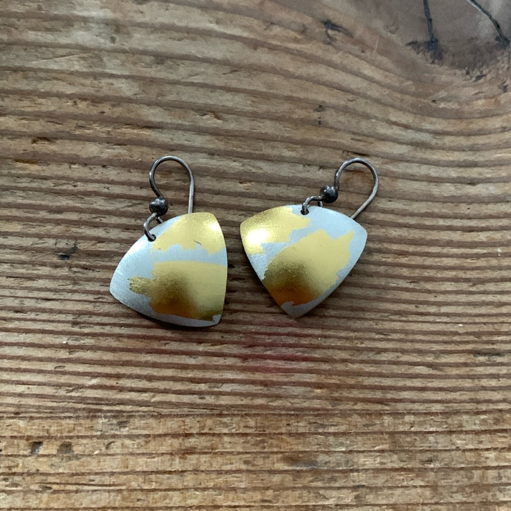 Aluminum and gold colored triangle earrings
